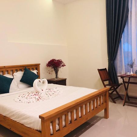 Sum Villa Hoi An An Bàn Kültér fotó