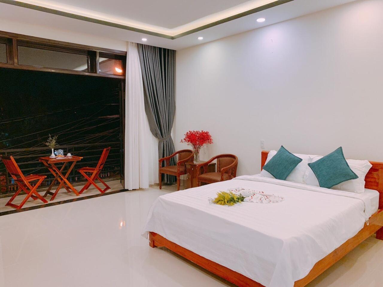 Sum Villa Hoi An An Bàn Kültér fotó