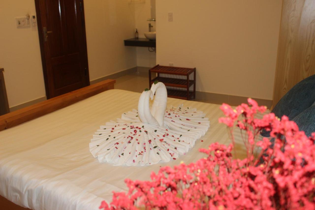 Sum Villa Hoi An An Bàn Kültér fotó