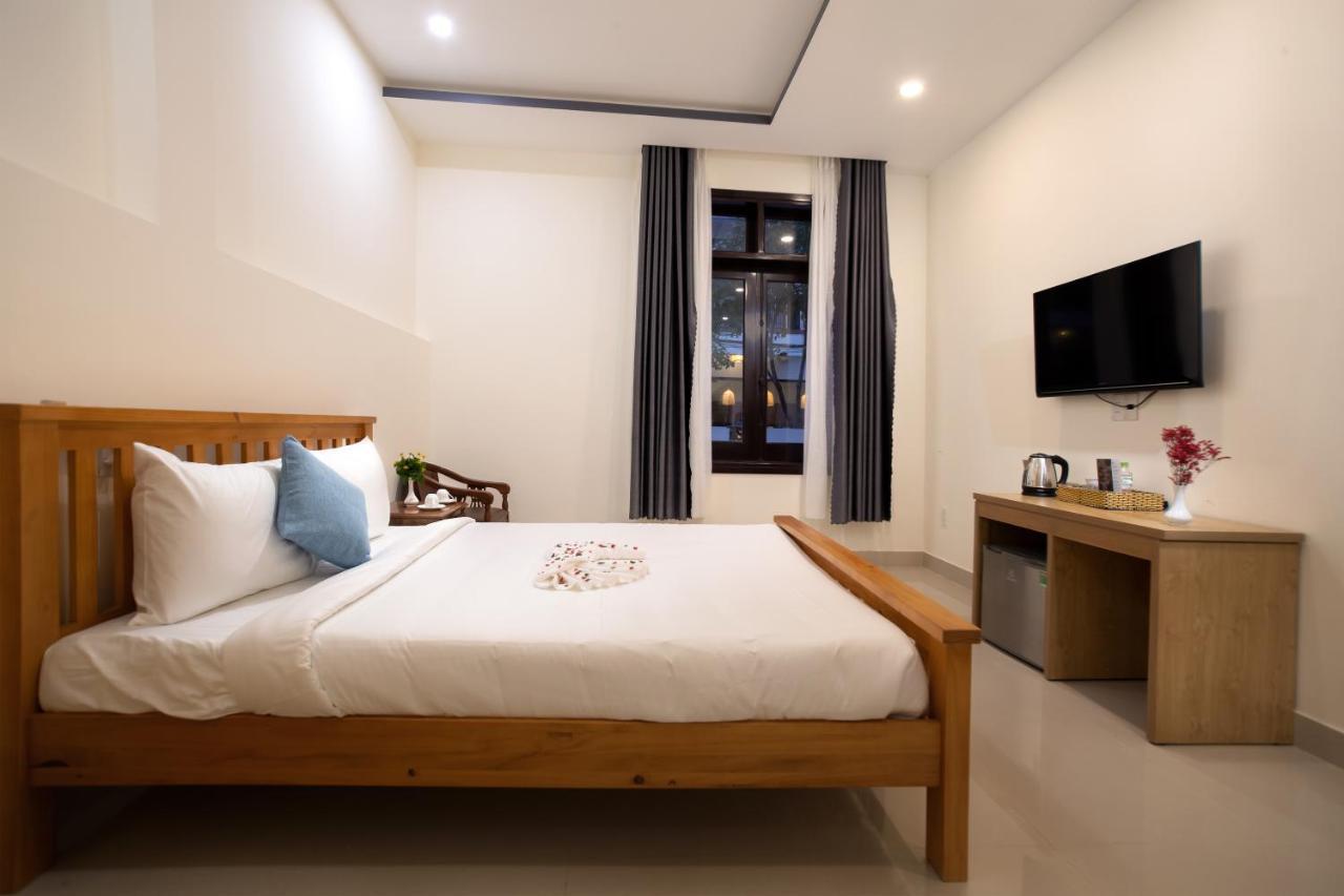 Sum Villa Hoi An An Bàn Kültér fotó