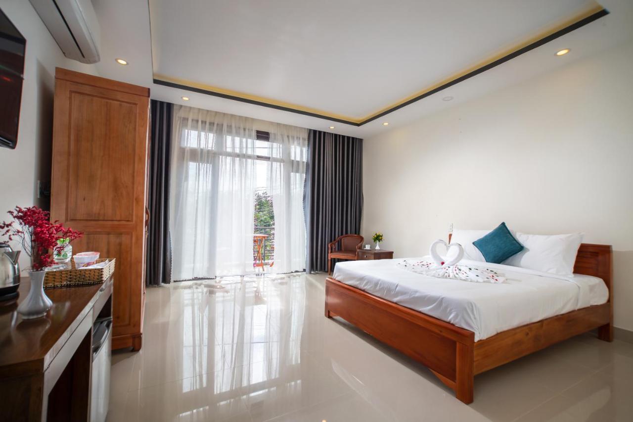 Sum Villa Hoi An An Bàn Kültér fotó