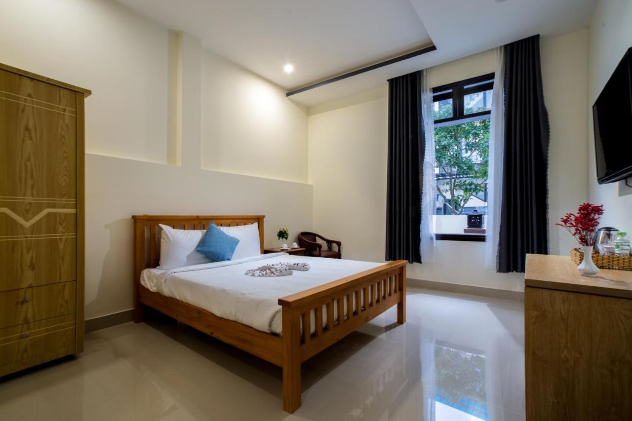 Sum Villa Hoi An An Bàn Kültér fotó