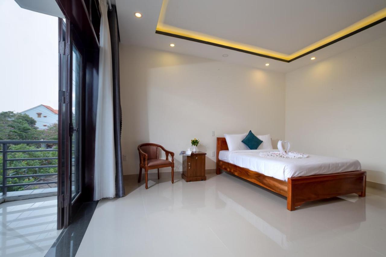 Sum Villa Hoi An An Bàn Kültér fotó