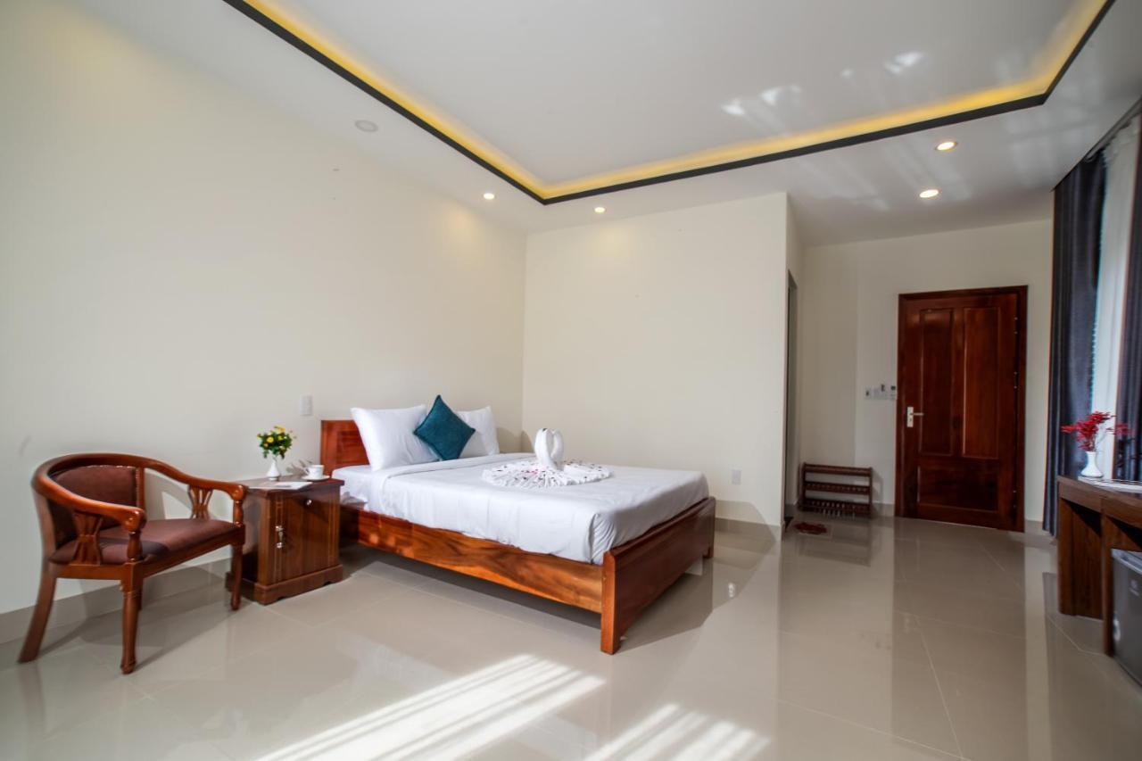 Sum Villa Hoi An An Bàn Kültér fotó